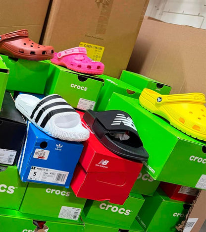 Crocs and sandals (adults and children)  -100 pairs.