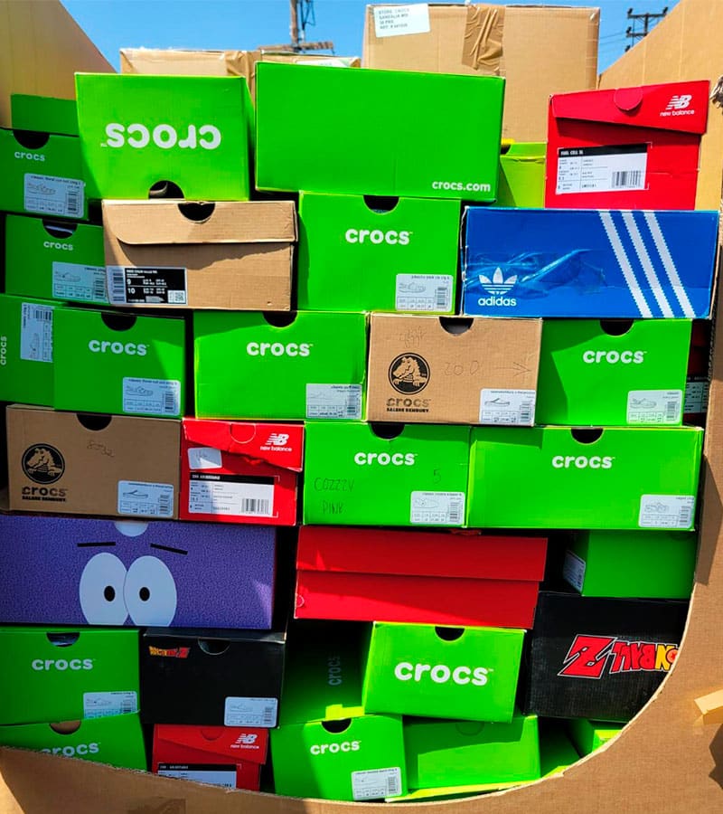 Crocs and sandals (adults and children)  -100 pairs.
